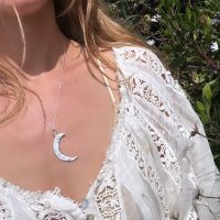 Silver Crescent Moon Spells Necklace